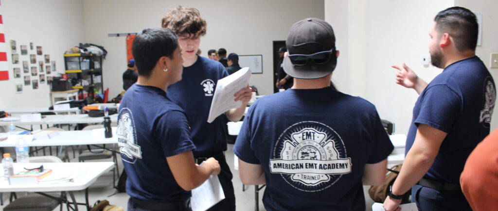 EMT students in class learning how to become an EMT